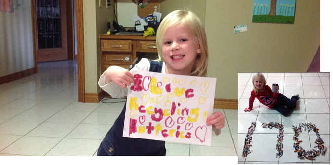 Lily shows her beautiful battery recycling poster during the Ontario Schools Battery Recycling Challenge
